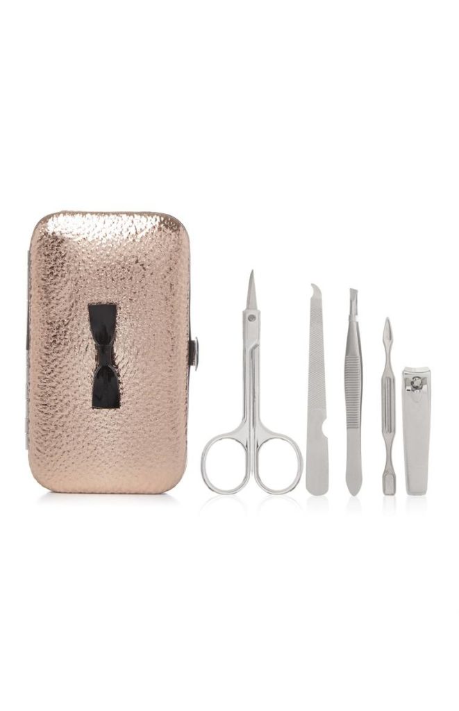 Kit de manicura tono oro rosa con lazo