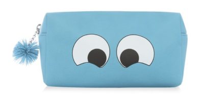 Bolso de mano azul con carita