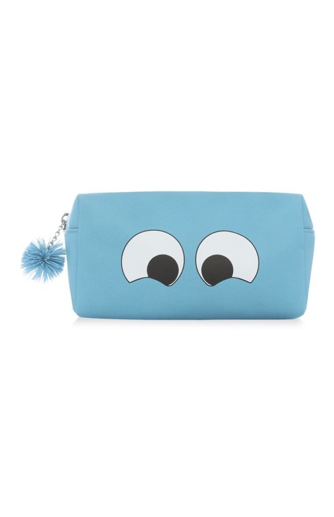 Bolso de mano azul con carita