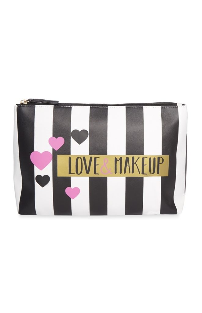 Bolso de maquillaje monocromático a rayas