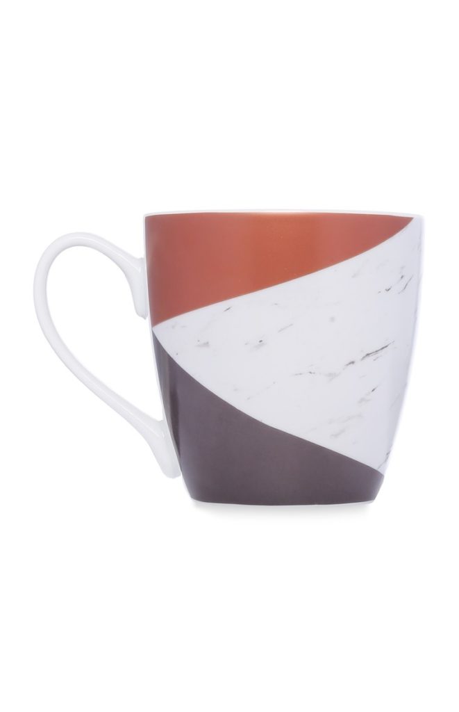 Taza de cerámica tricolor